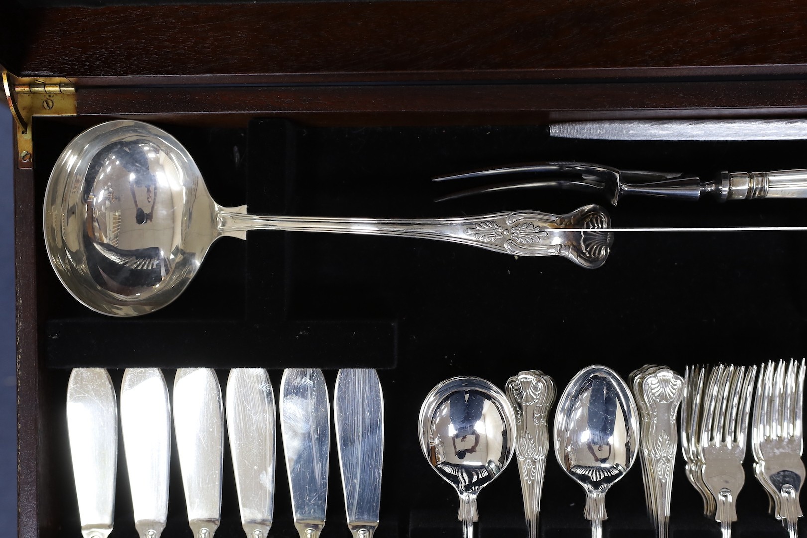 A leather inset canteen of silver plated flatware